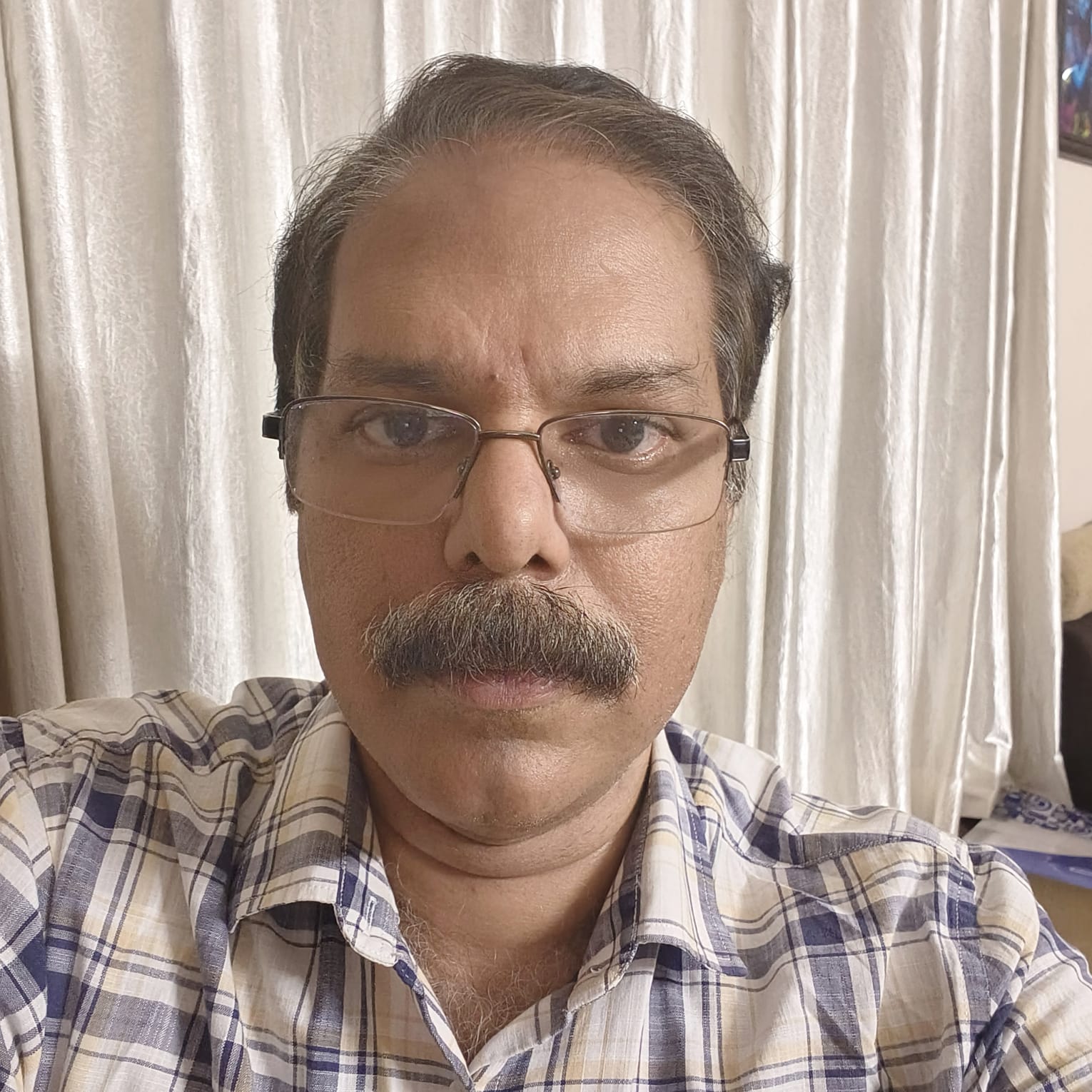 Nikhil V